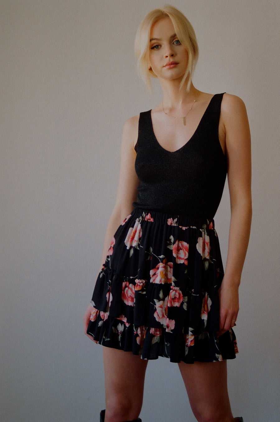 Tiered mini skirt in black floral print